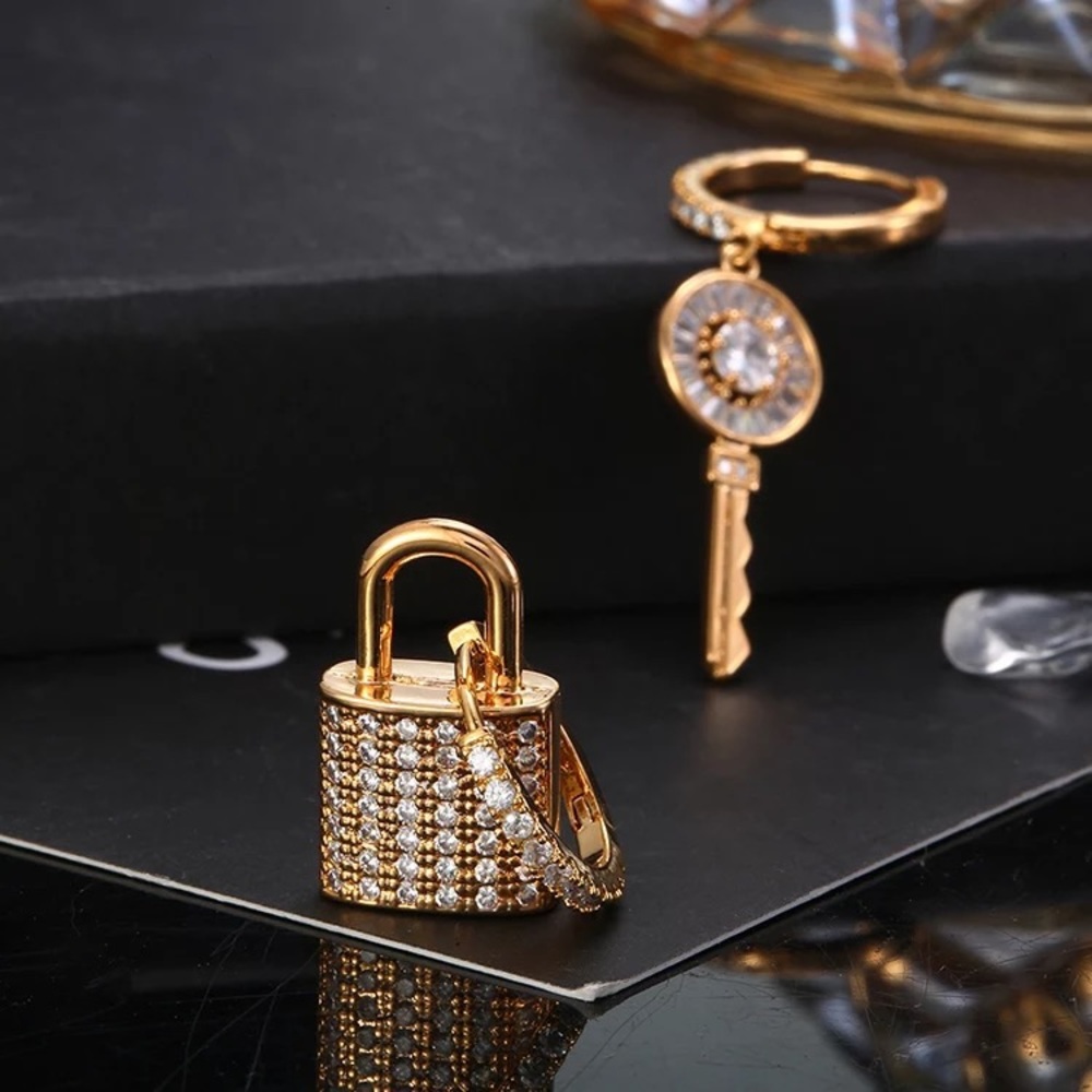 Rose gold blingy lock and key earrings
